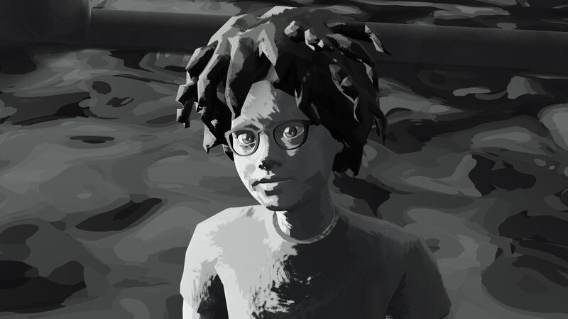 A gray scale image of a person with dark hair and glasses look up at the camera.