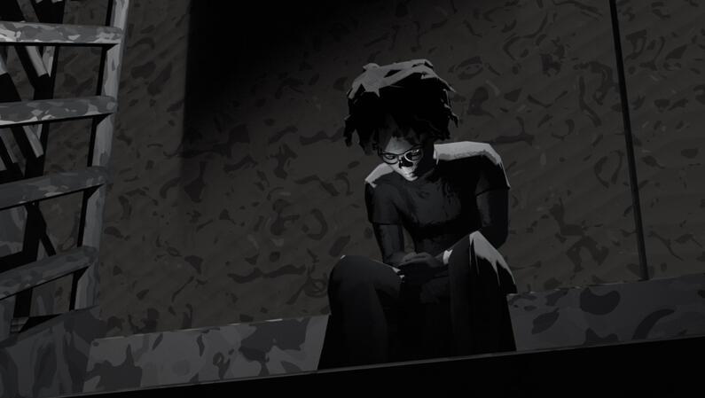 A person in grayscale with dark hair and glasses sits inside of a dim stairwell and looks at the ground.